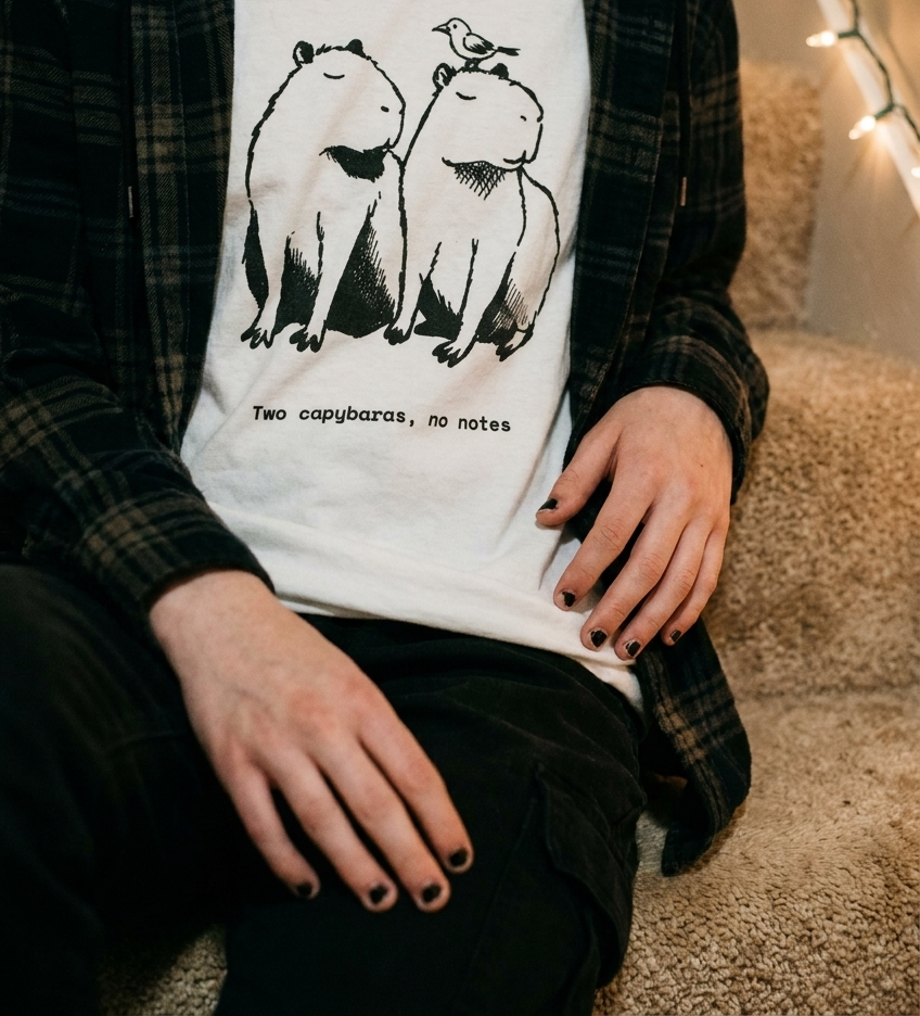 Person wearing the Two Capybaras No Notes tee